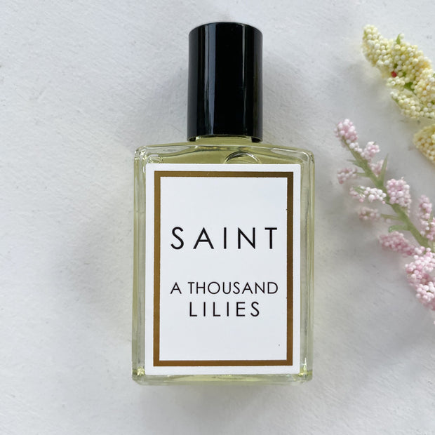 SAINT Roll-On Holy Oil Perfume in St. Thomas Aquinas A Thousand Lilies Bath & Body Crossroads Collective