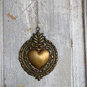 Golden Ex-voto with green patina