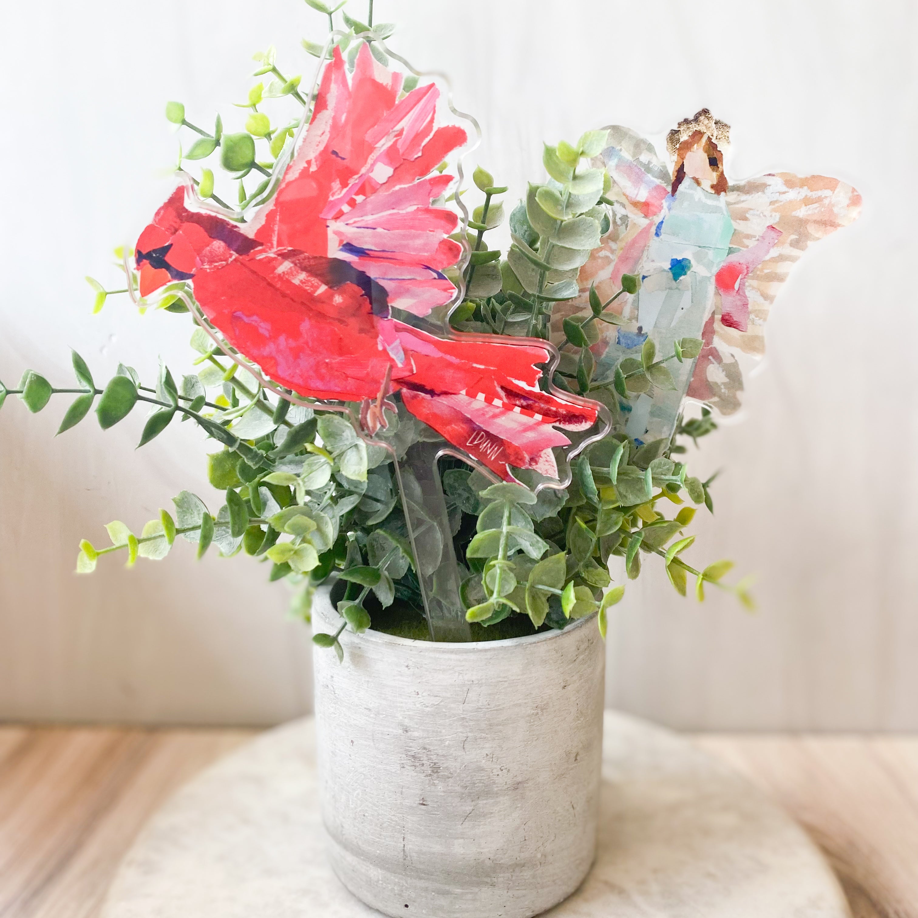 CARDINAL IN FLIGHT PLANT STICK