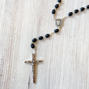 7 x 9mm Black Boxwood Bead Rosary with Christ Madonna Center and Crucifix, Boxed
