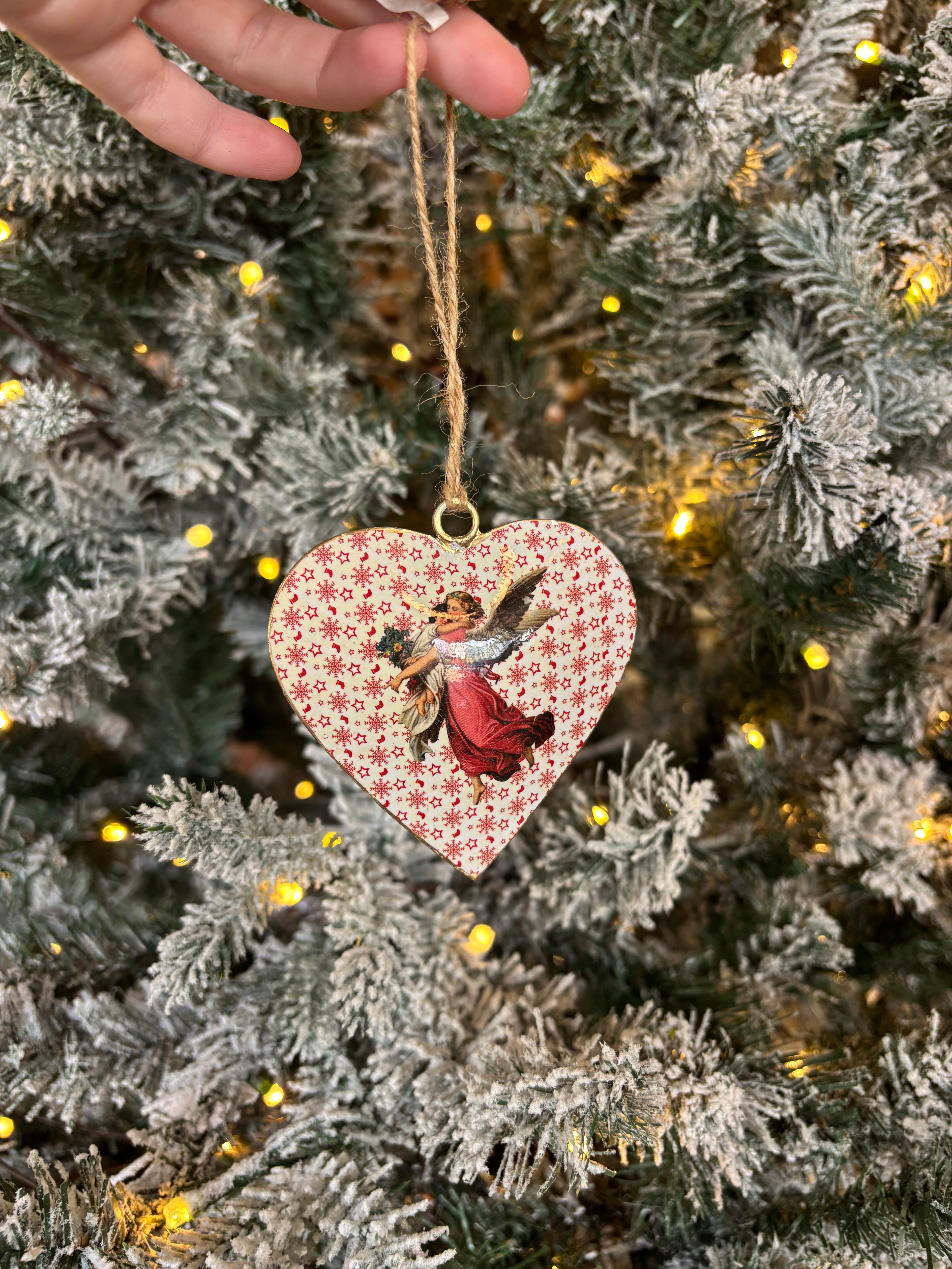 Hanging heart with angels