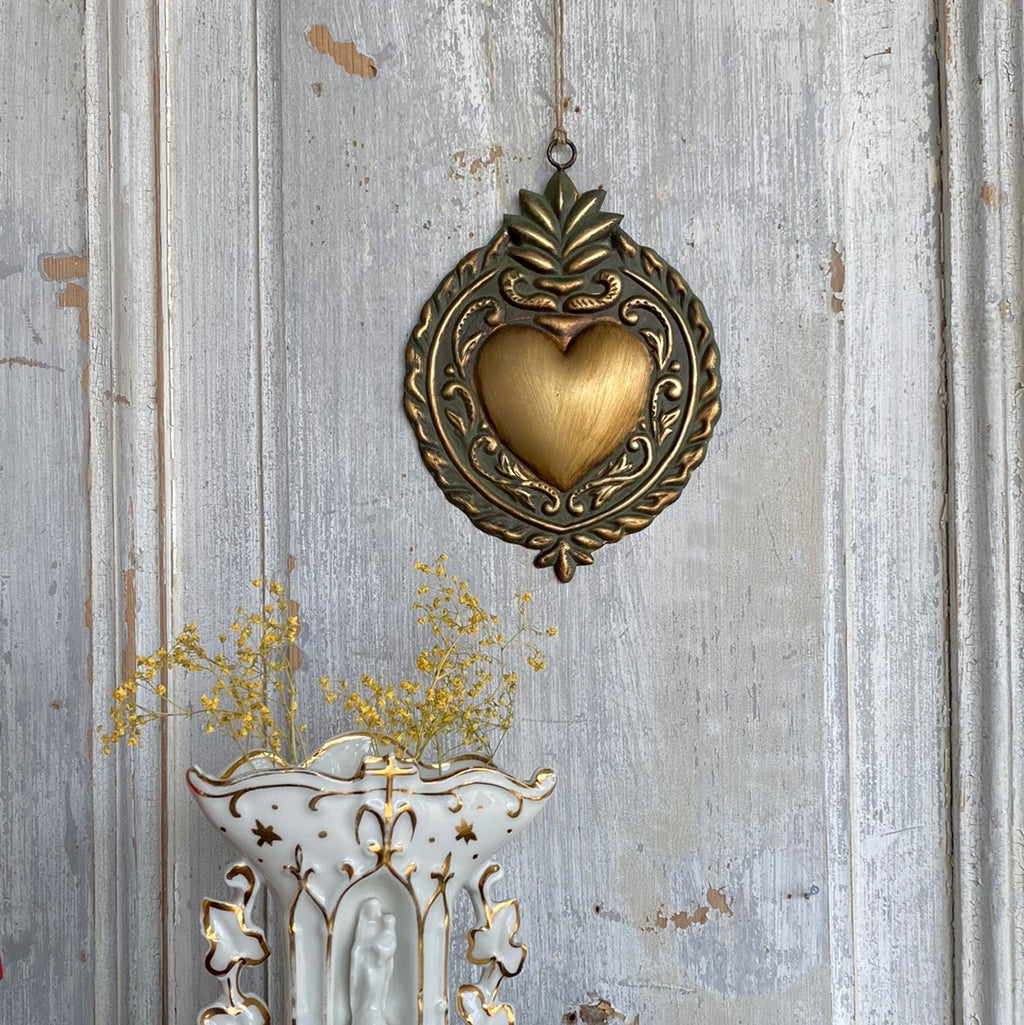 Golden Ex-voto with green patina