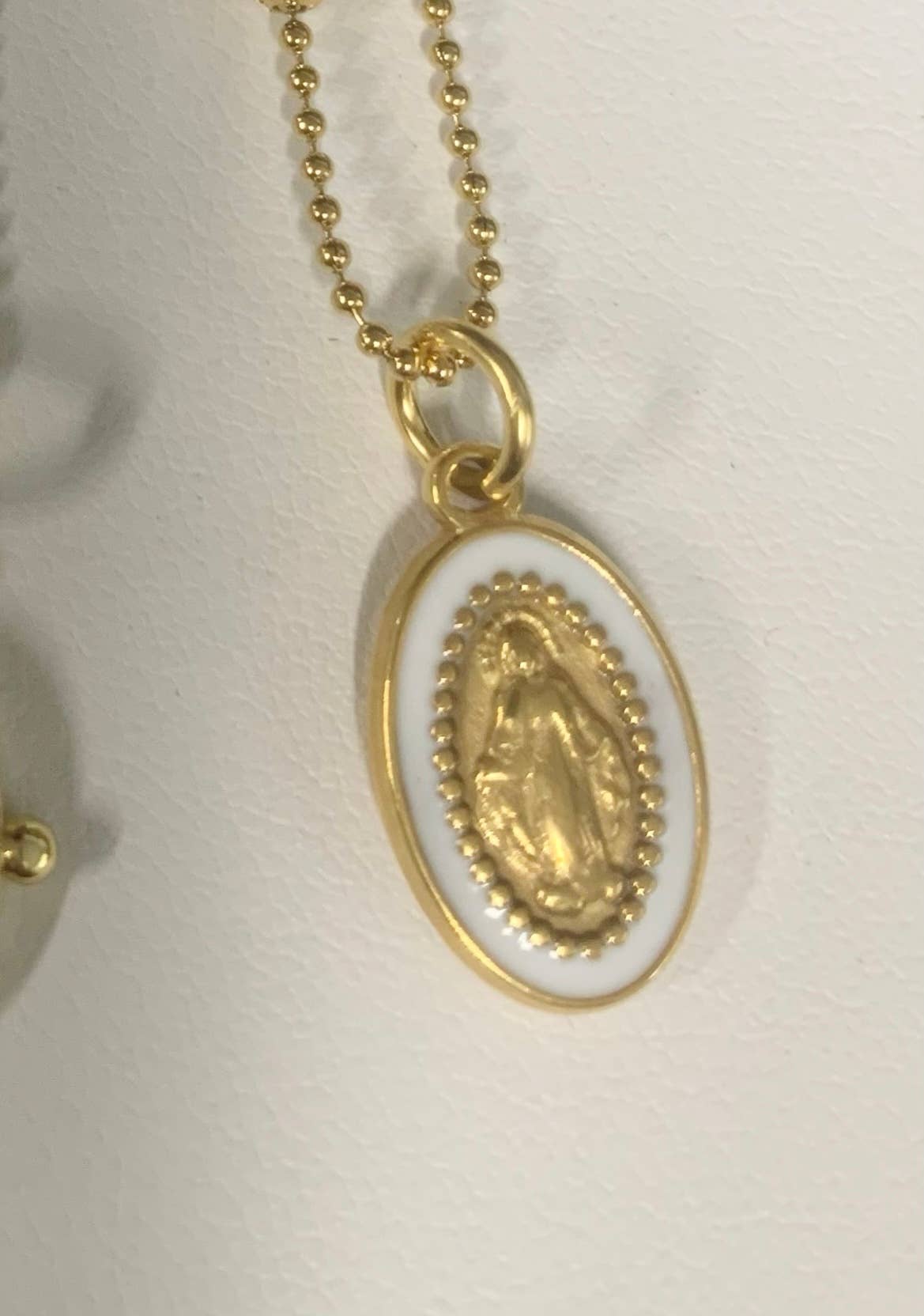 N242 white Enamel and Gold Mary Medal 