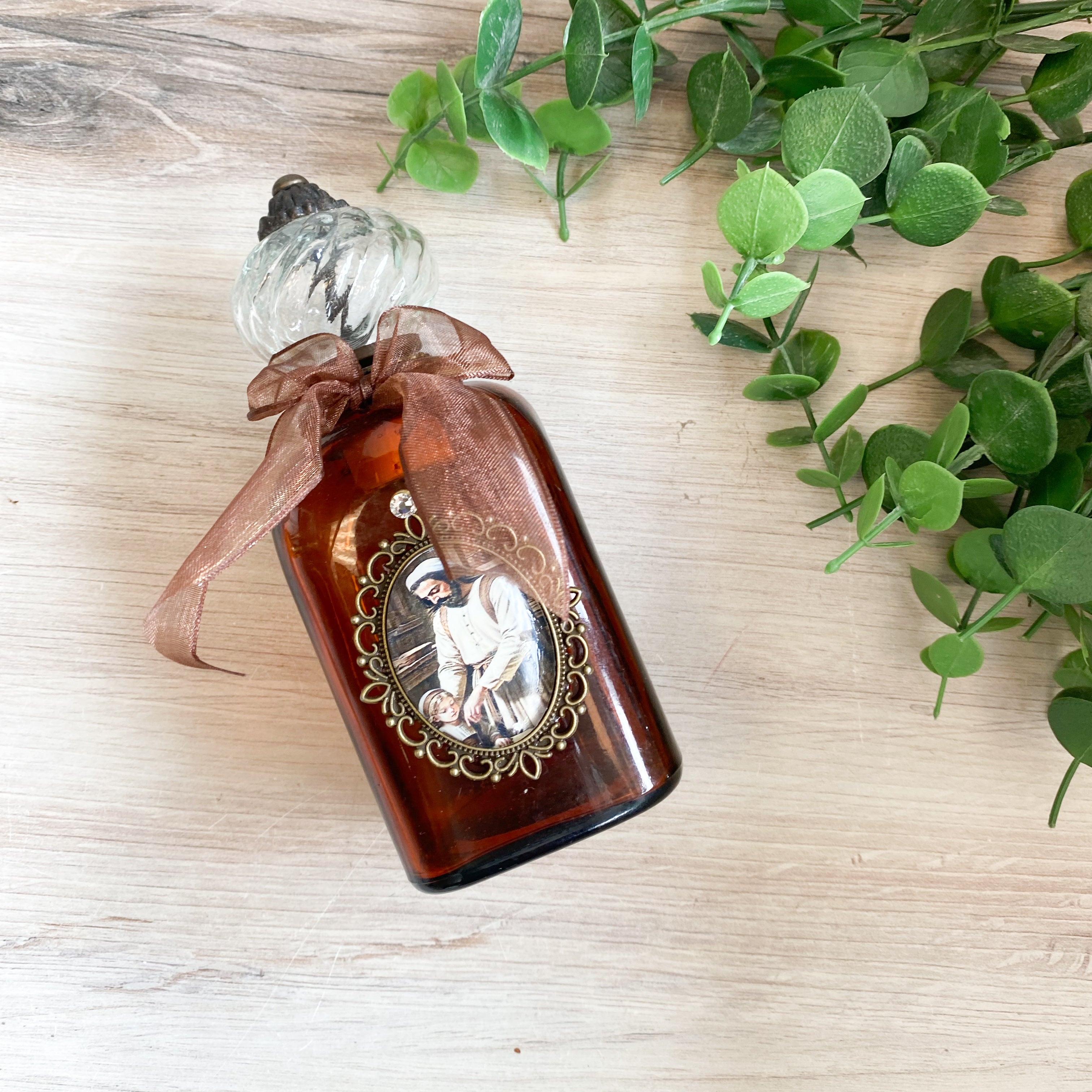 HWB24083 - Holy Water Bottle - St. Joseph with the Child Jesus, Large Antique Amber