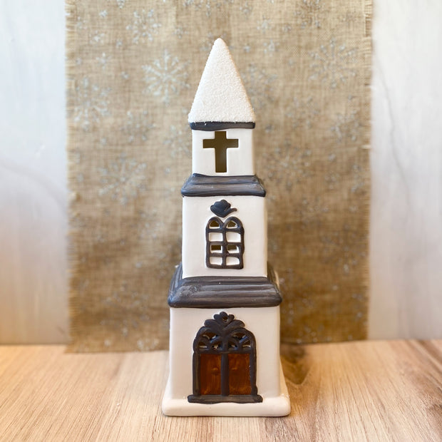 WHITE AND GRAY LIGHTED CHURCH WITH LIGHT