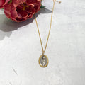Handcrafted Fine Silver Small Oval OLO Guadalupe accented with 22k gold on a gold filled chain