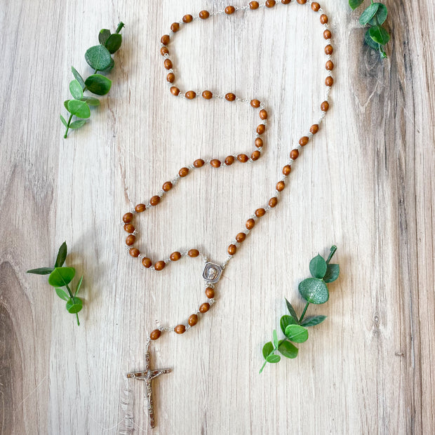 7 x 9mm Brown Boxwood Bead Rosary with Christ Madonna Center and Crucifix