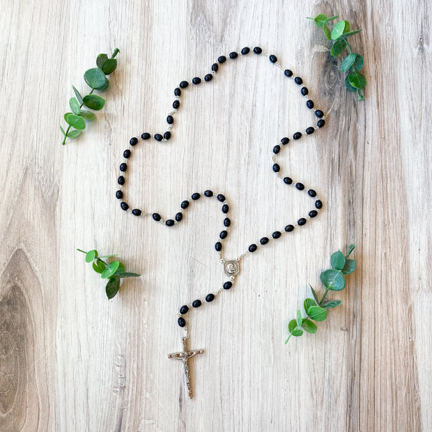 7 x 9mm Black Boxwood Bead Rosary with Christ Madonna Center and Crucifix, Boxed