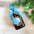 HWB24109 - Holy Water Bottle -  Madonna of the Streets, Large Antique Amber