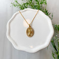 18k Gold Plated Guadalupe Ray Oval Necklace with CZ Border