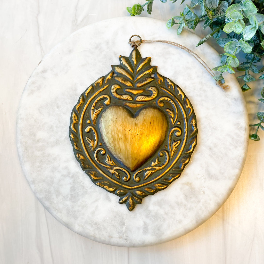 Golden Ex-voto with green patina
