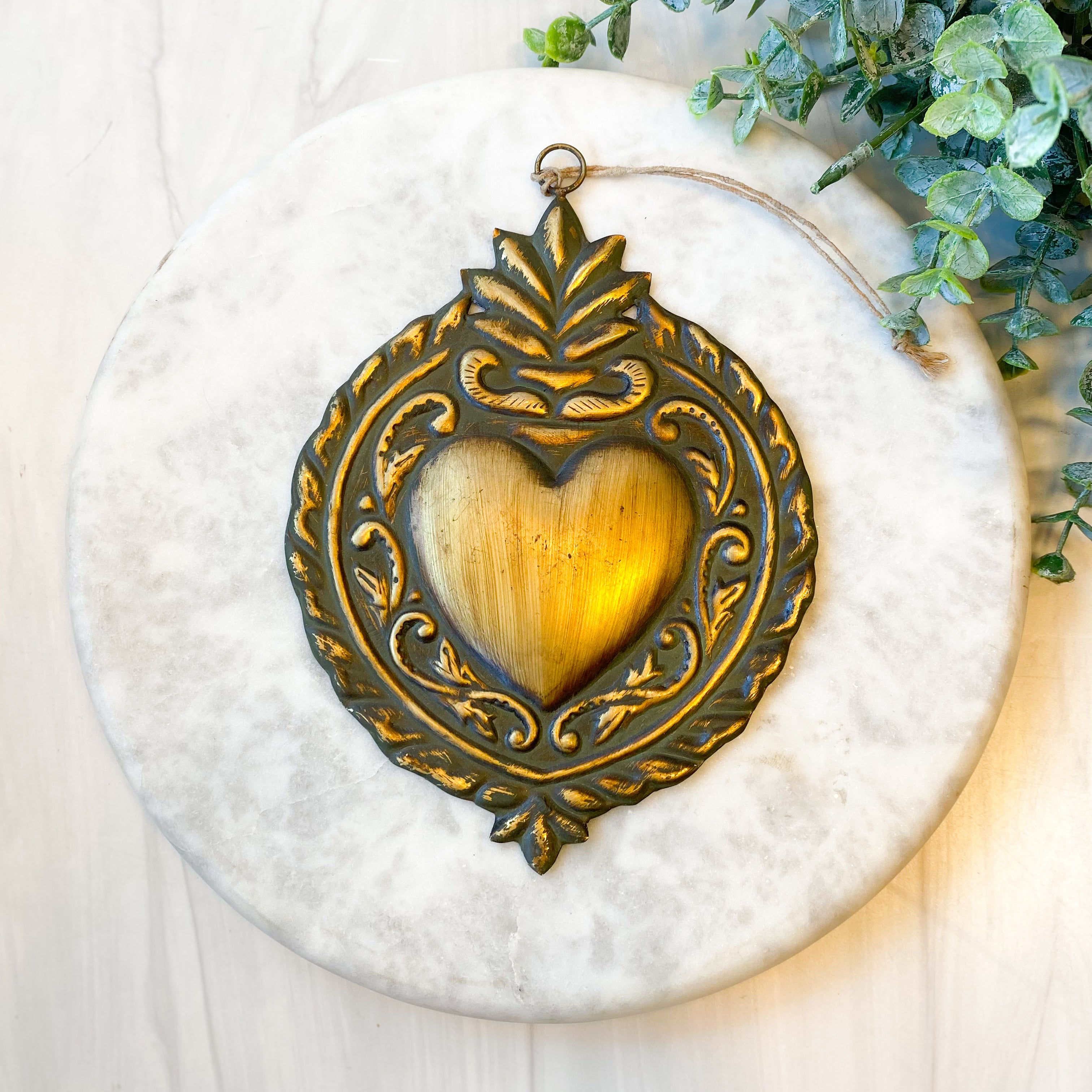 Golden Ex-voto with green patina