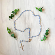 7mm Sapphire Crystal Aurora Borealis Rosary with Deluxe Crucifix and Center in a Grey Velvet Box