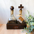 "Compadre" Vessels - Handblown Bottles w/ Ball & Cross Toppers on Iron Stand