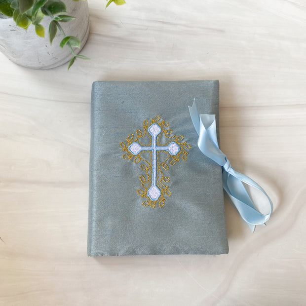 Blue Album with Gold and White Cross