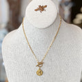 Gold Toggle Necklace with Antique Medal
