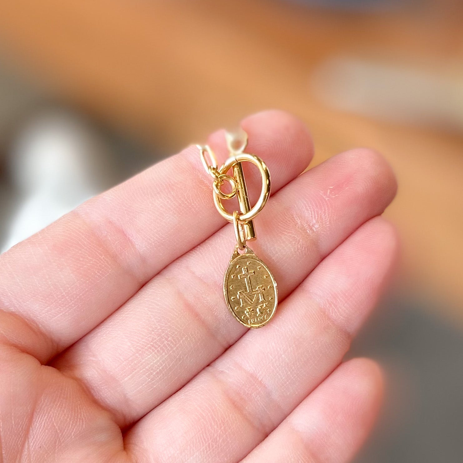 Gold Toggle Necklace with Antique Medal