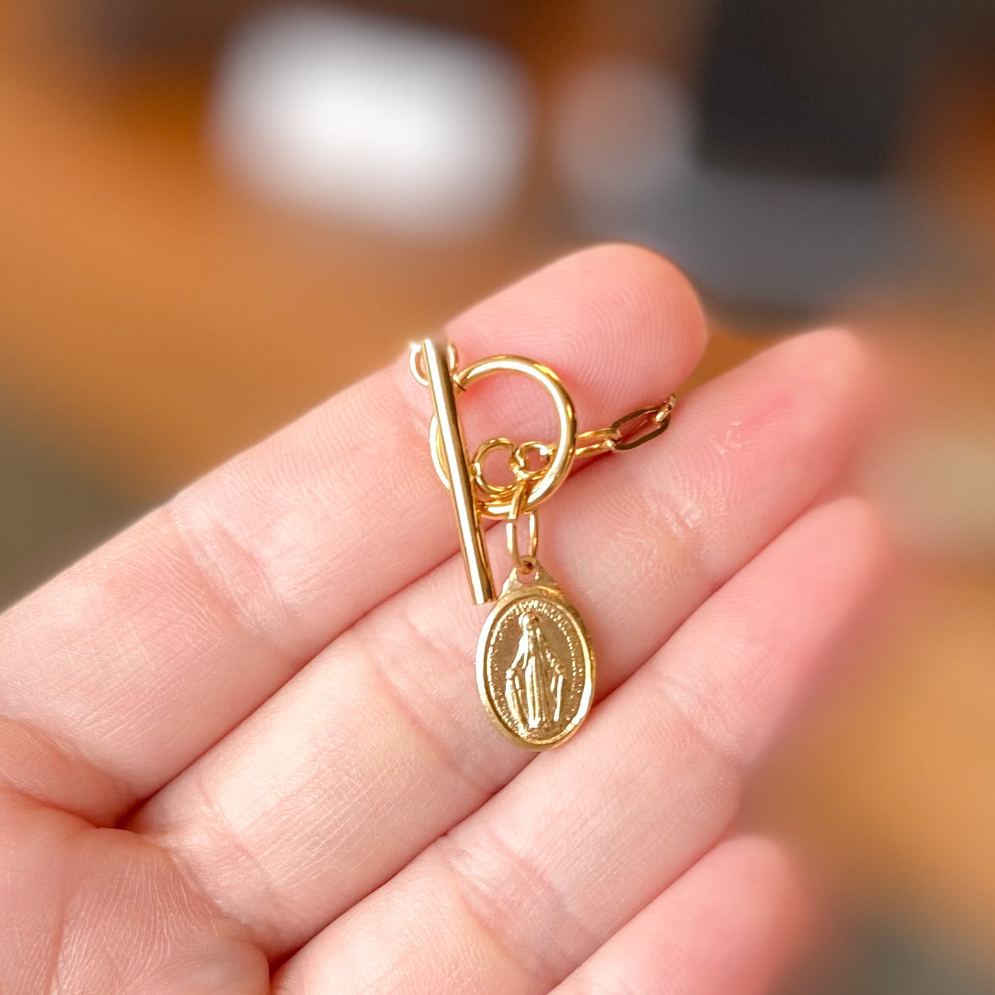 Gold Toggle Necklace with Antique Medal