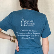 Saint Teresa of Calcutta Unisex T-Shirt in Blue Clothing & Apparel Crossroads Collective