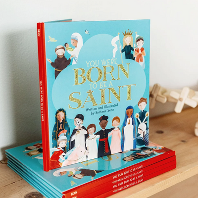 You Were Born to be a Saint Hardcover Book Children's books Crossroads Collective